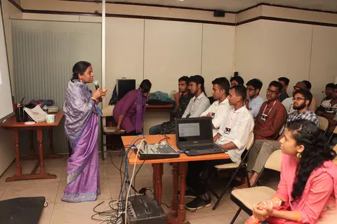 Mrs. Mina Ven der Spek counseling the students on workshop. 